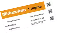 Etiqueta para medicamento impresa en varios colores, incluye varios códigos QR